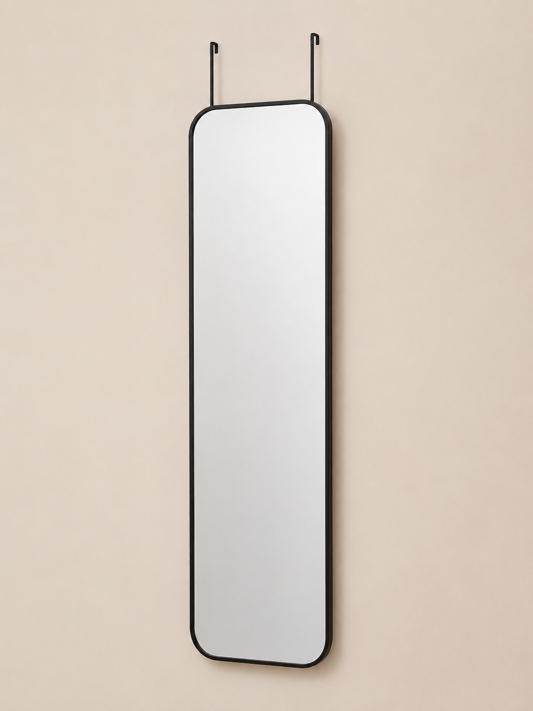 Black-framed full-length wall mirror